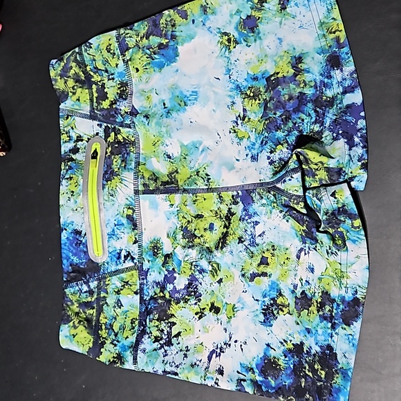 Athleta Athletic Shorts featuring vibrant colors w signature zipper on back. - Picture 3 of 8